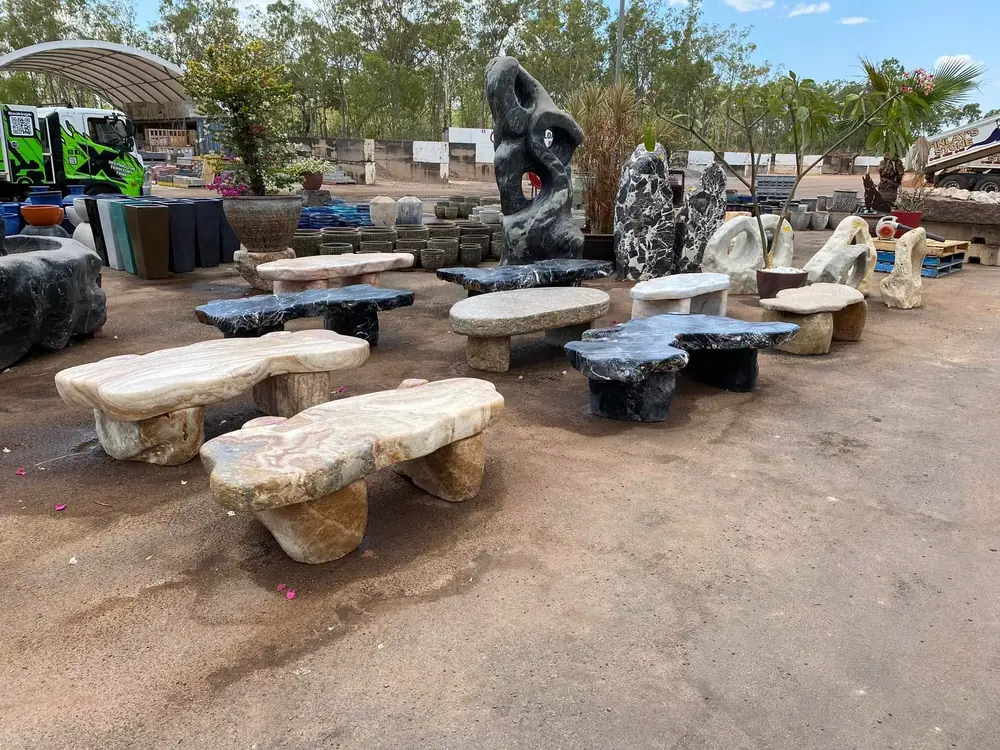 Natural stone benches and garden features on display