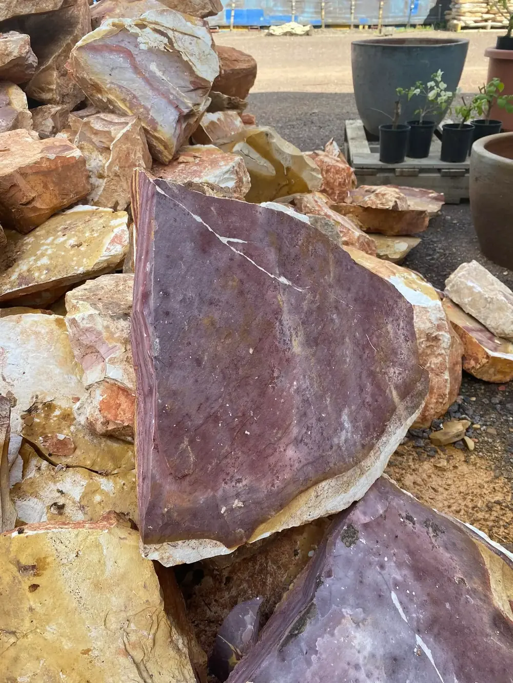 Natural stone piece showing rich colour and veining