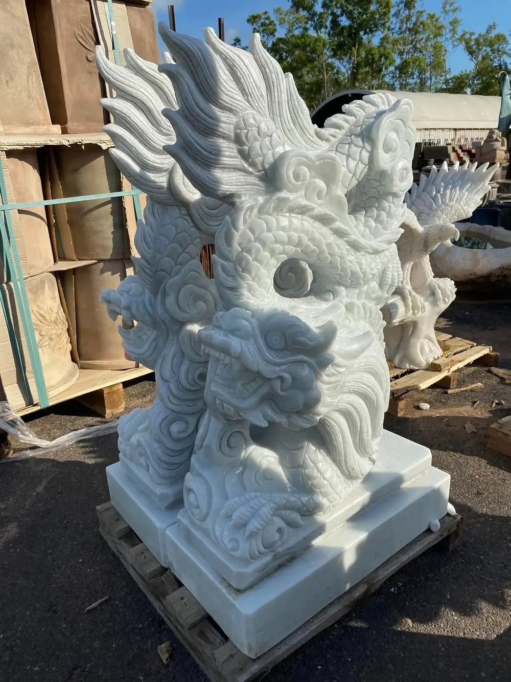 Detailed white stone dragon carving